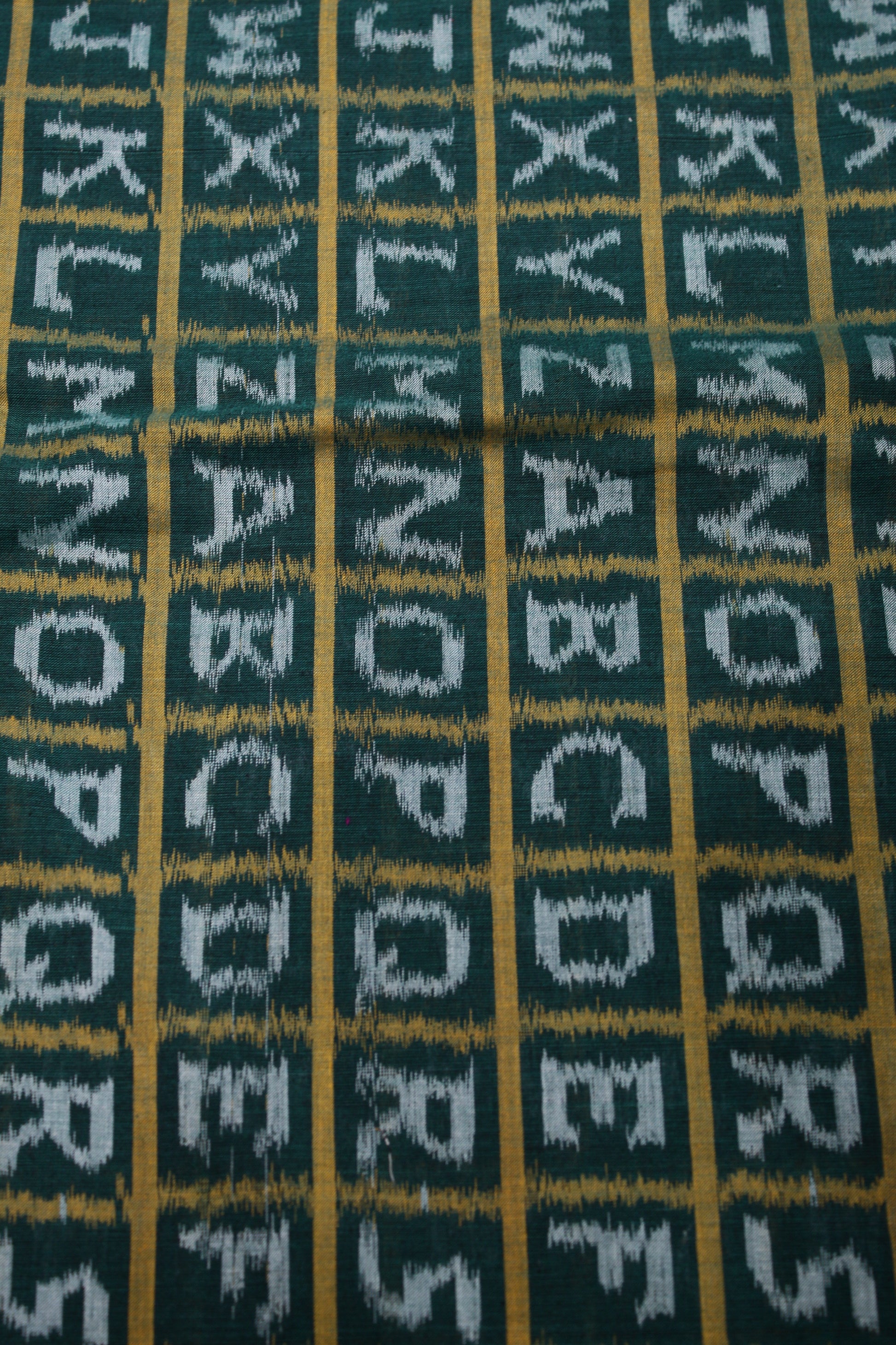 Green English Alphabet Sambalpuri Ikat Cotton Fabric