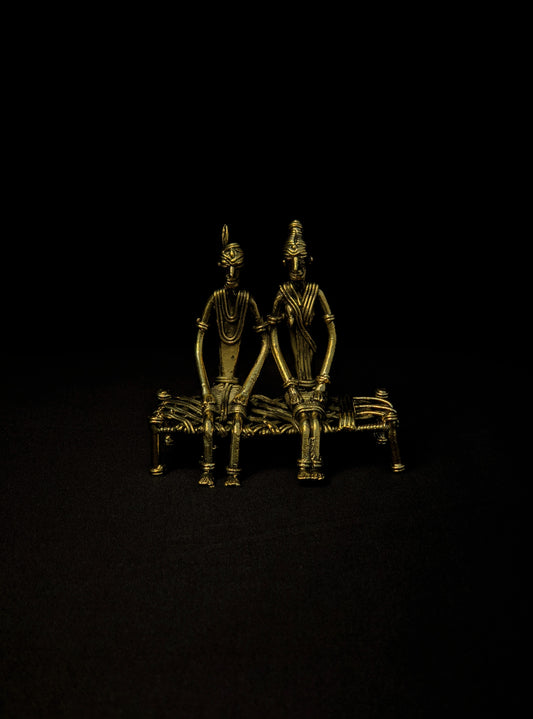 Dhokra - Tribal Couple sitting on Bed